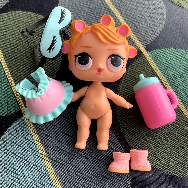 lol doll with hair curlers